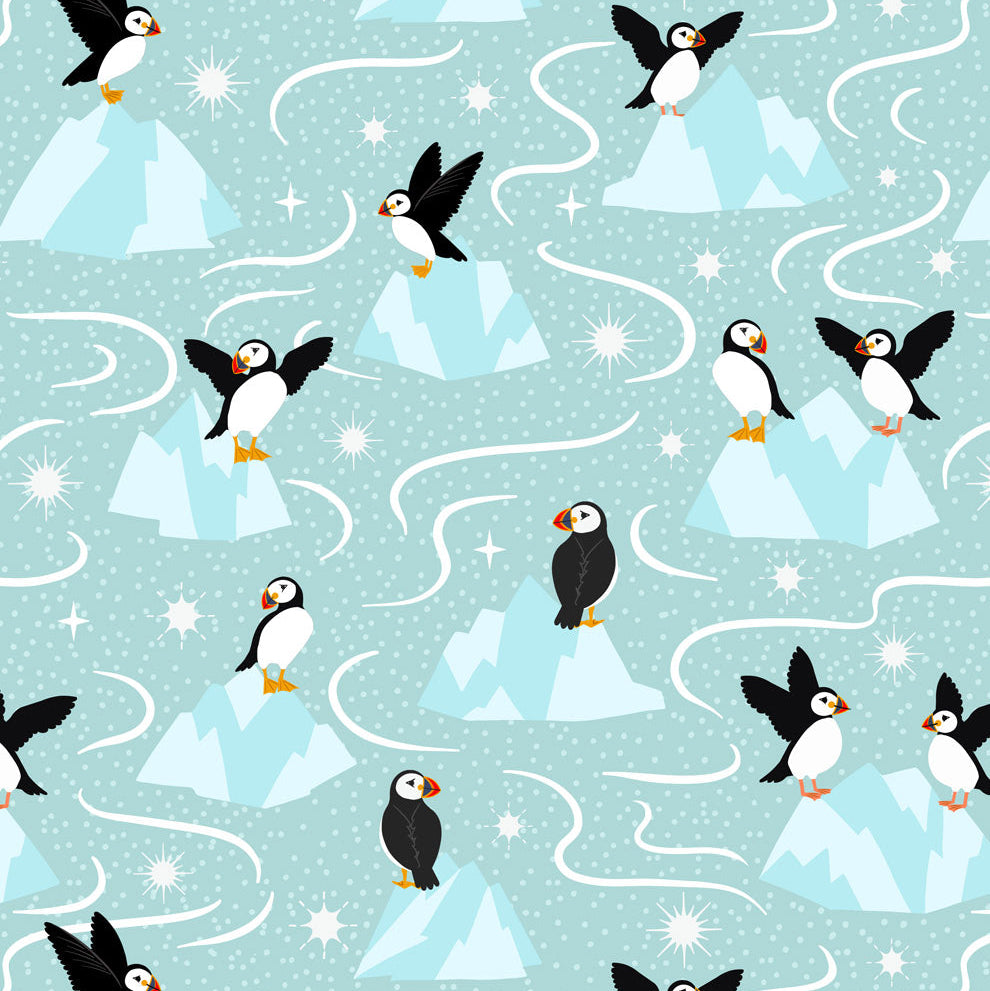 Pattern of penguins on icebergs and blue background