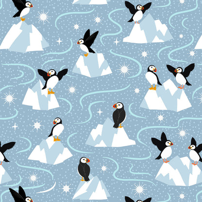 Pattern of penguins on icebergs and blue water with snowflakes.