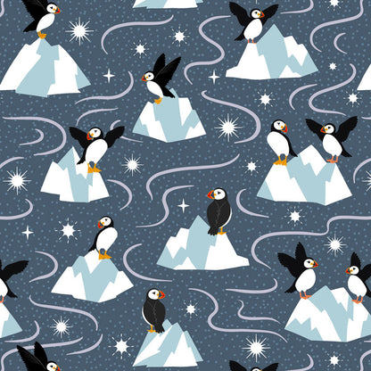 Pattern of penguins and icebergs on a blue background