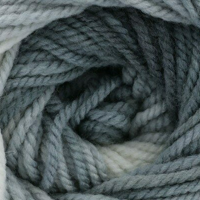 Close-up of a skein of gray and white yarn